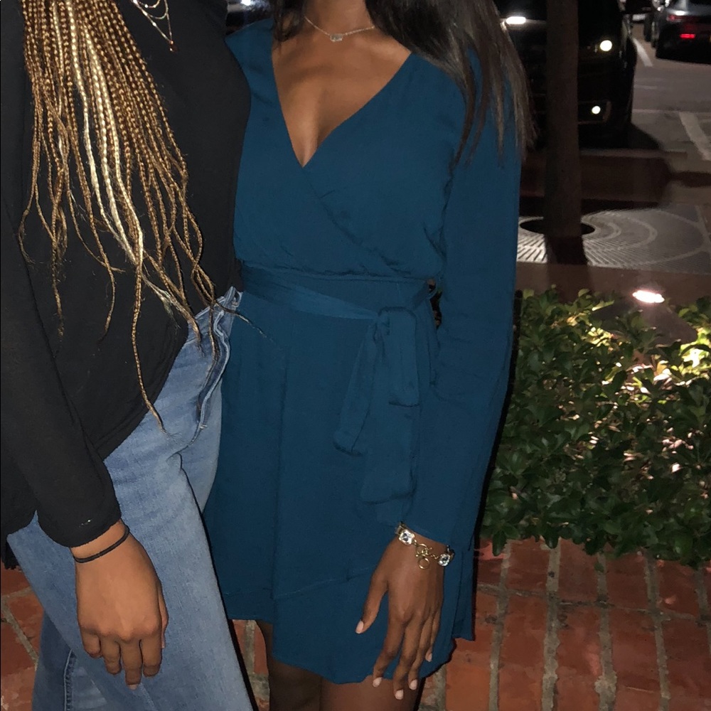 Francesca’s teal wrap dress